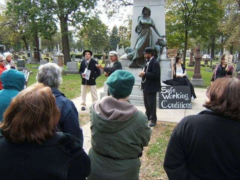 guided cemetery walking tour at naper settlement with costumed interpreters sharing pioneer stories for naperville community history