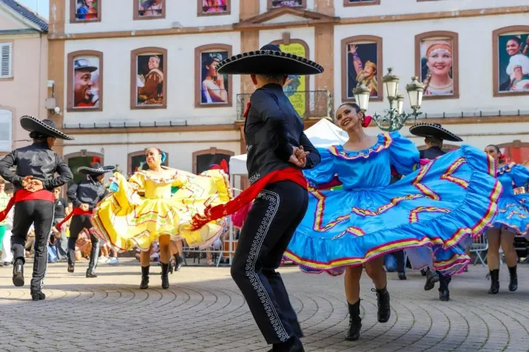 folklorico dancers performing in colorful traditional dresses at the naperville hispanic heritage festival 2025 celebrating mexican independence
